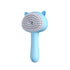 Hair cleaning brush with mist, multifunctional self-cleaning pet grooming tool in blue color.